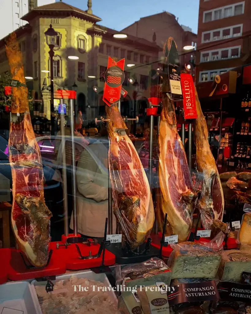 Jamón stall at Mercado del Sur in Gijon, Spain